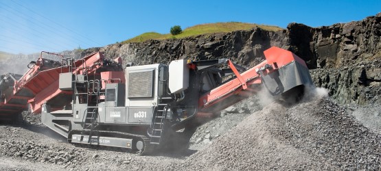 Sandvik QH331 cone crusher working in a limestone quarry in Scotland